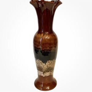 BROWN DRIP POTTERY VASE. THE VASE IS 10 INCHES TALL